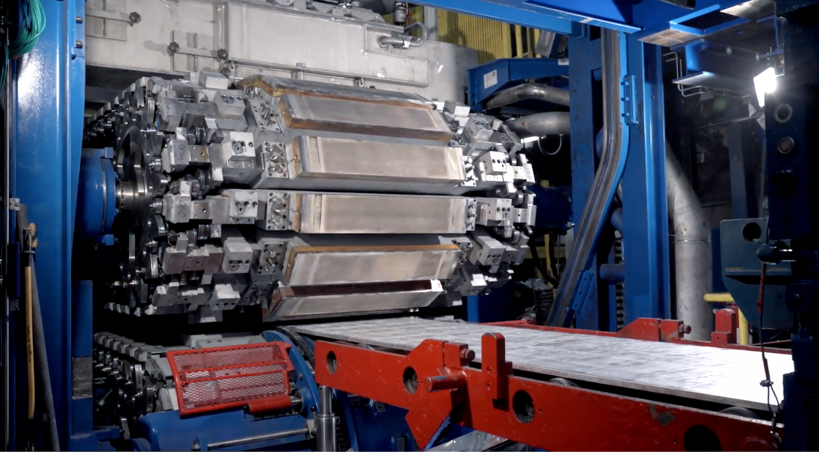 Nexcast® continuous casting roller feeding a sheet of aluminum coil on the production line.